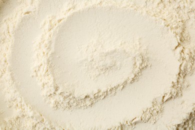 Texture of baking powder as background, top view