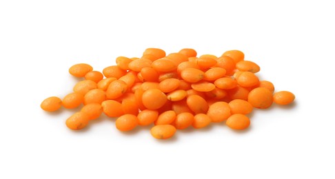 Pile of raw red lentils isolated on white