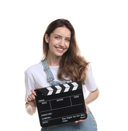 Making movie. Smiling woman with clapperboard on white background