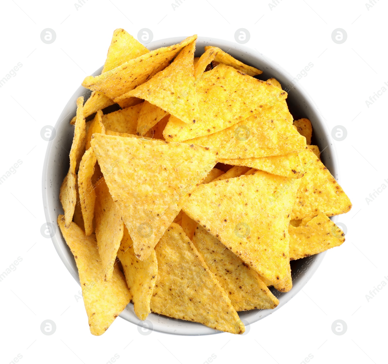 Photo of Bowl with tasty Mexican nachos chips on white background, top view