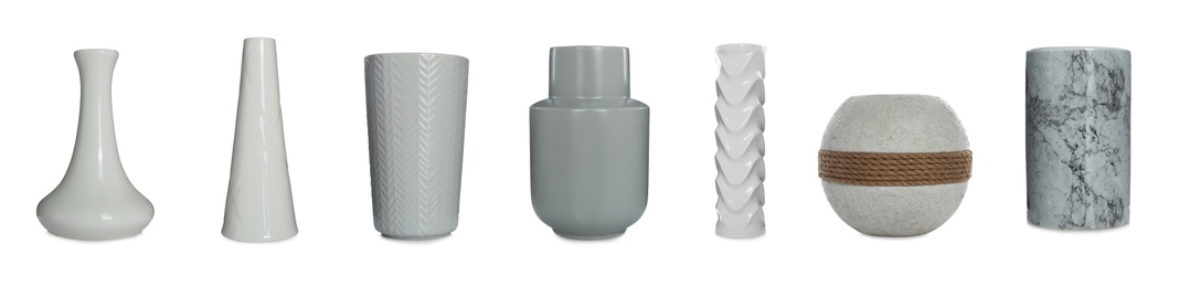 Set of beautiful ceramic vases on white background. Banner design