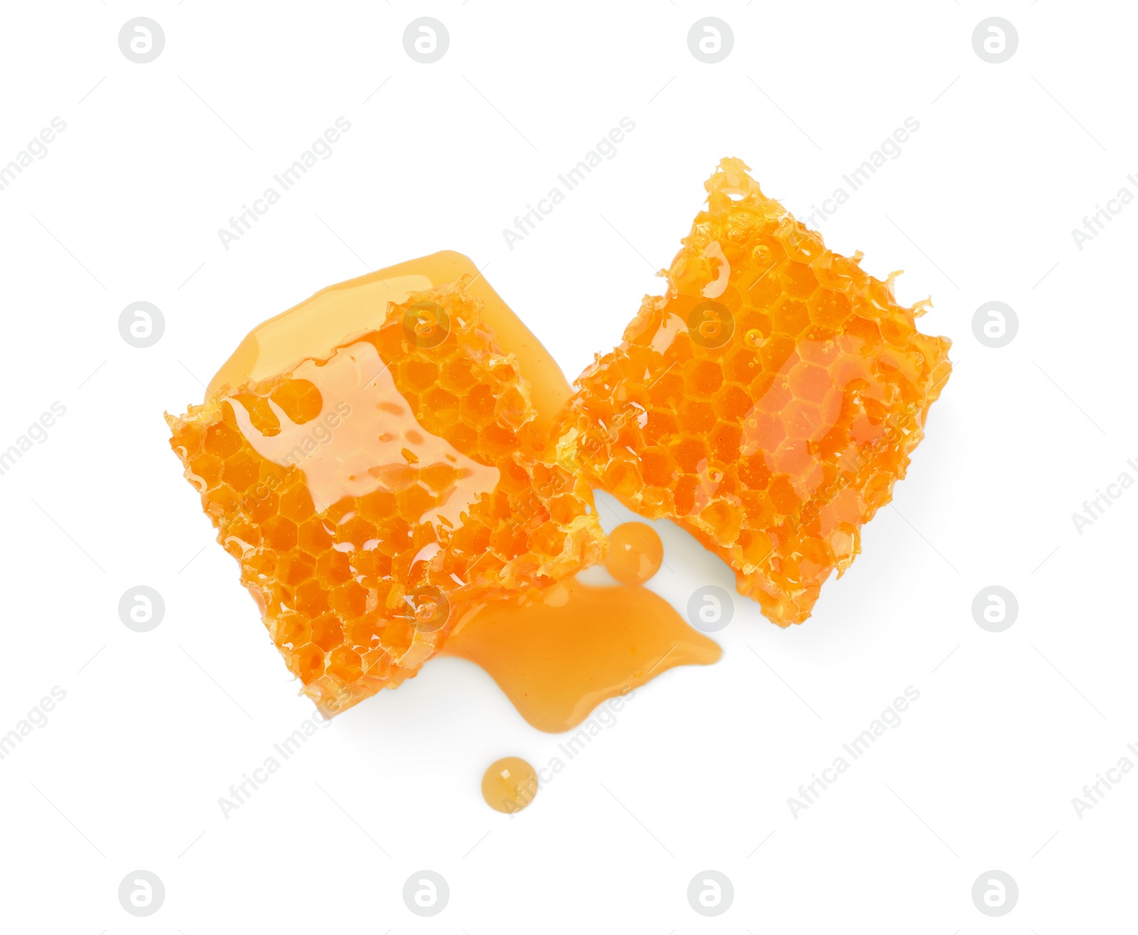 Photo of Natural honeycombs with tasty honey isolated on white, top view