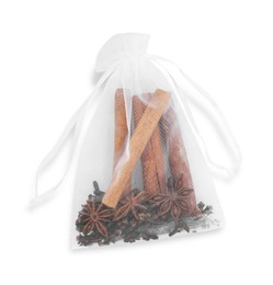 Photo of Scented sachet with cinnamon and anise isolated on white, top view