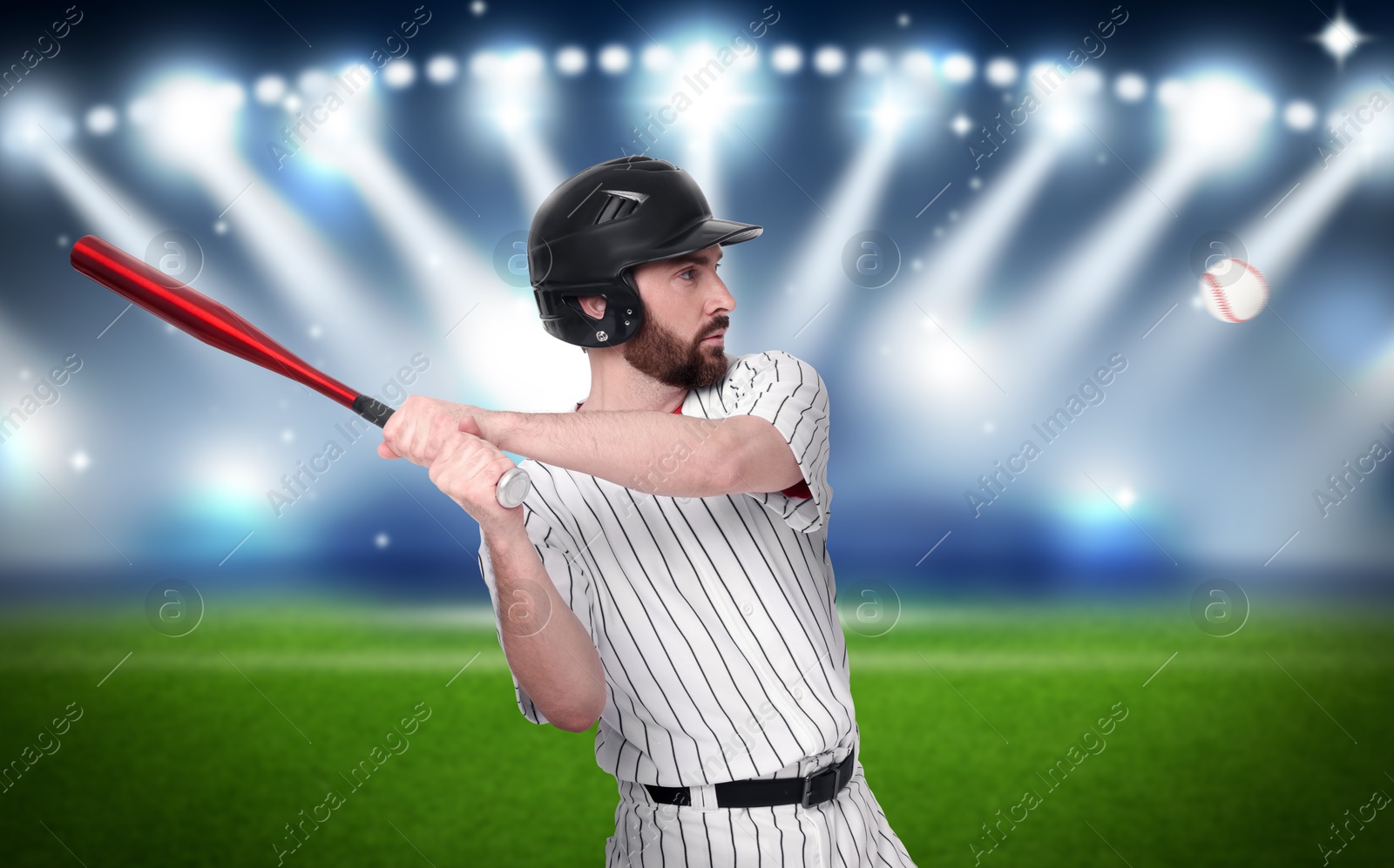 Image of Professional baseball player with bat on stadium