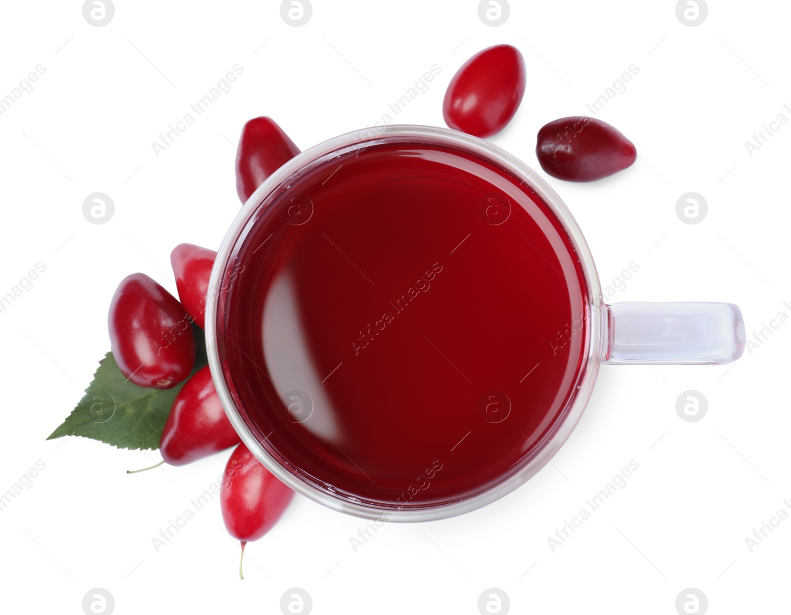 Photo of Glass cup of fresh dogwood tea, berries and leaf on white background, top view