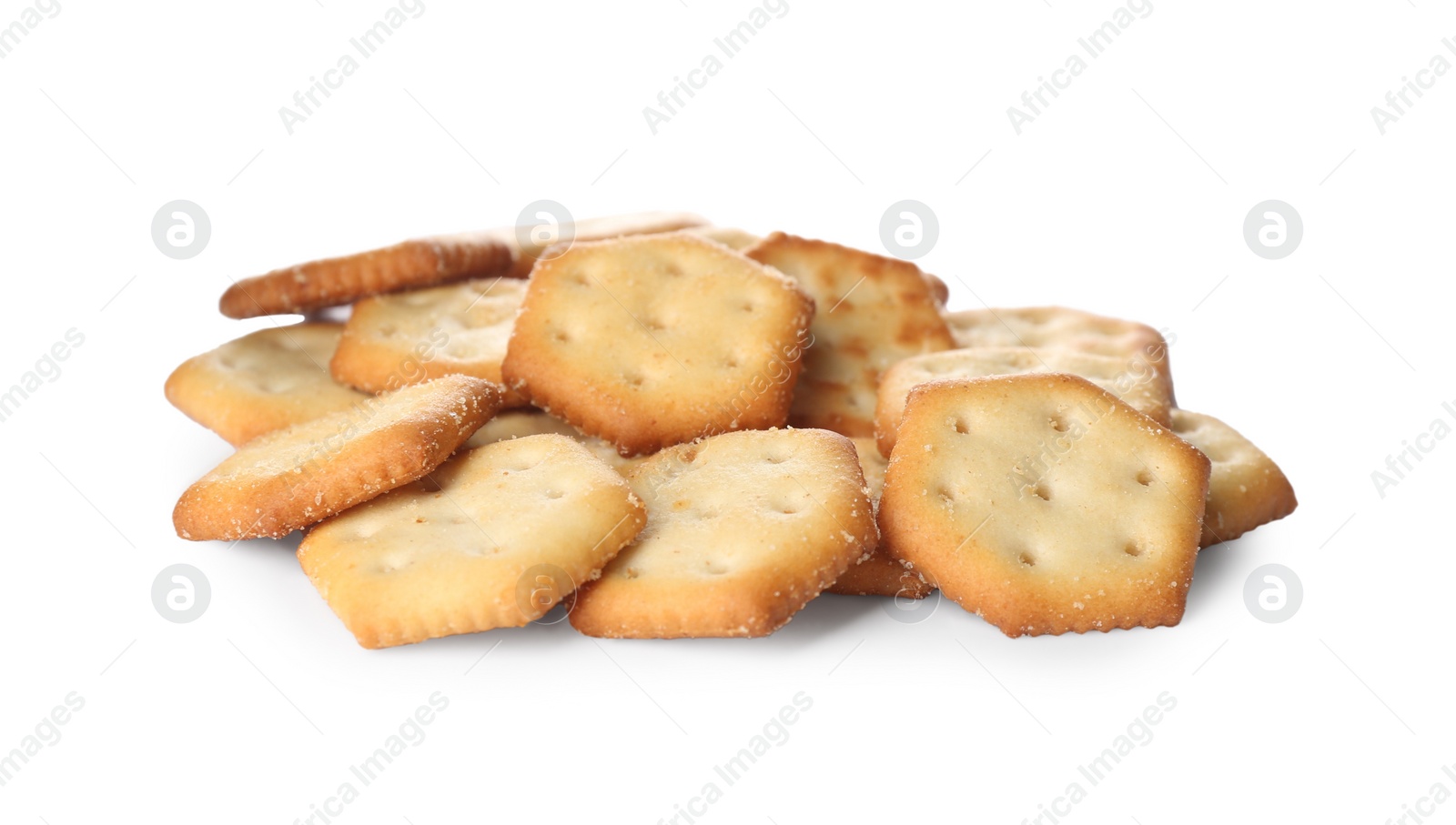 Photo of Crispy crackers isolated on white. Delicious snack