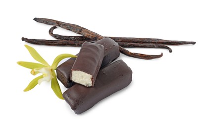 Photo of Glazed curd cheese bars, vanilla pods and flower isolated on white