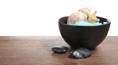 Photo of Light blue sea salt in bowl, spa stones, starfish and seashell on wooden table against white background. Space for text