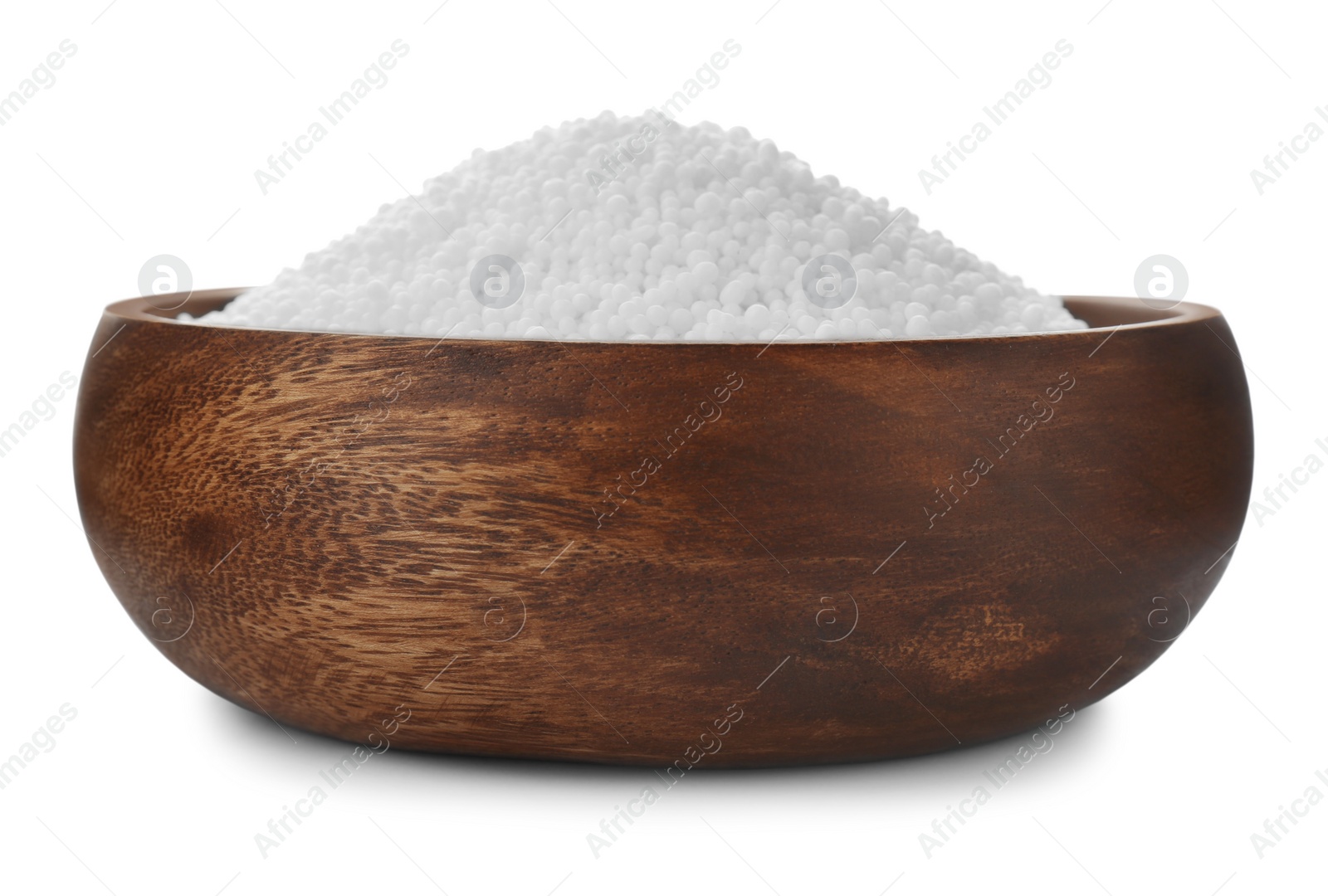 Photo of Pellets of ammonium nitrate in bowl isolated on white. Mineral fertilizer