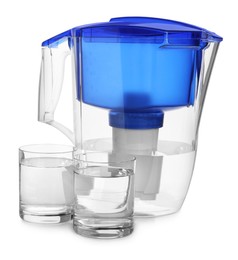 Filter jug and glasses with purified water on white background