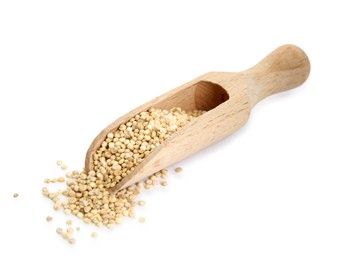 Photo of Wooden scoop with quinoa on white background