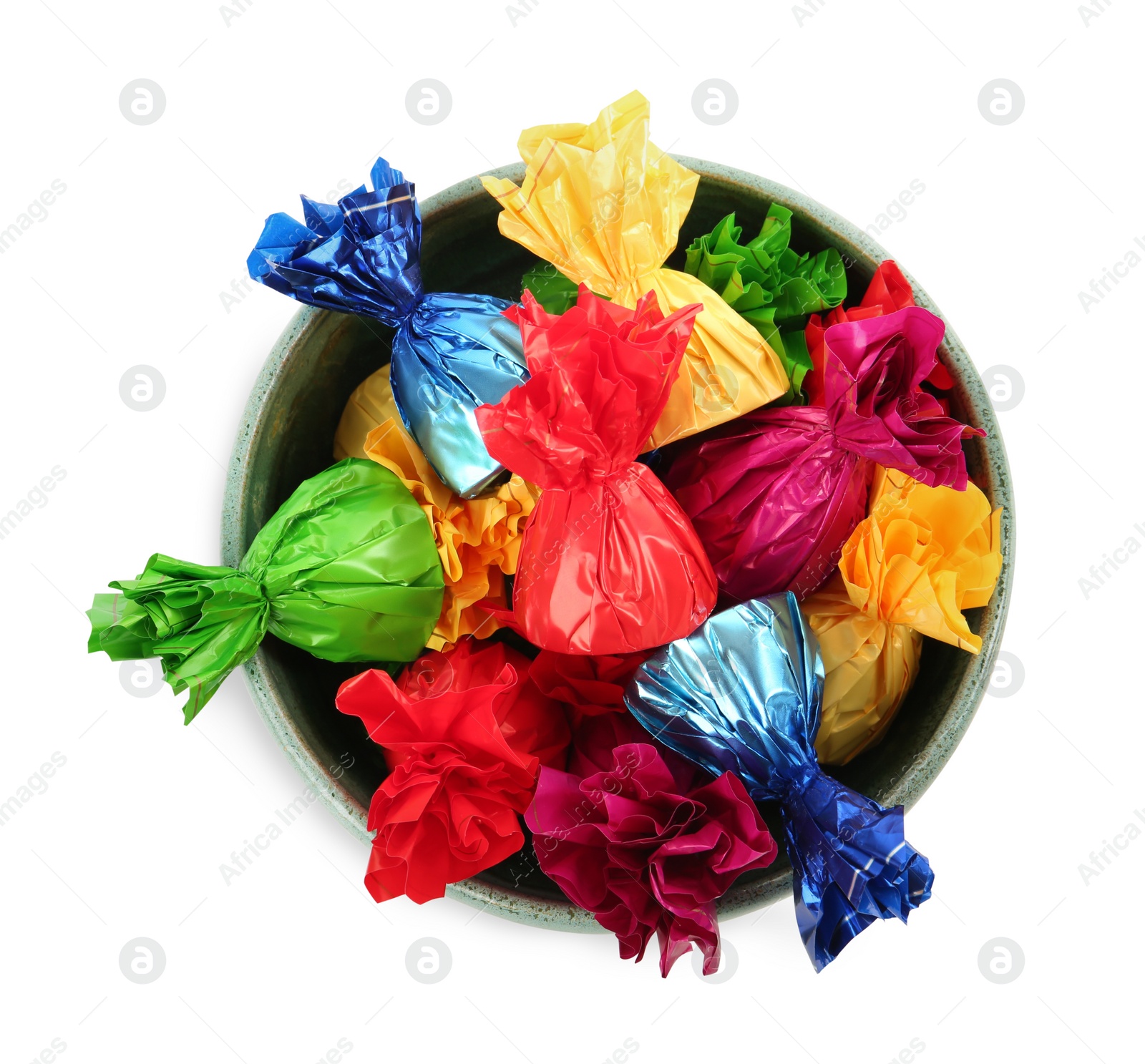 Photo of Bowl with candies in colorful wrappers isolated on white, top view