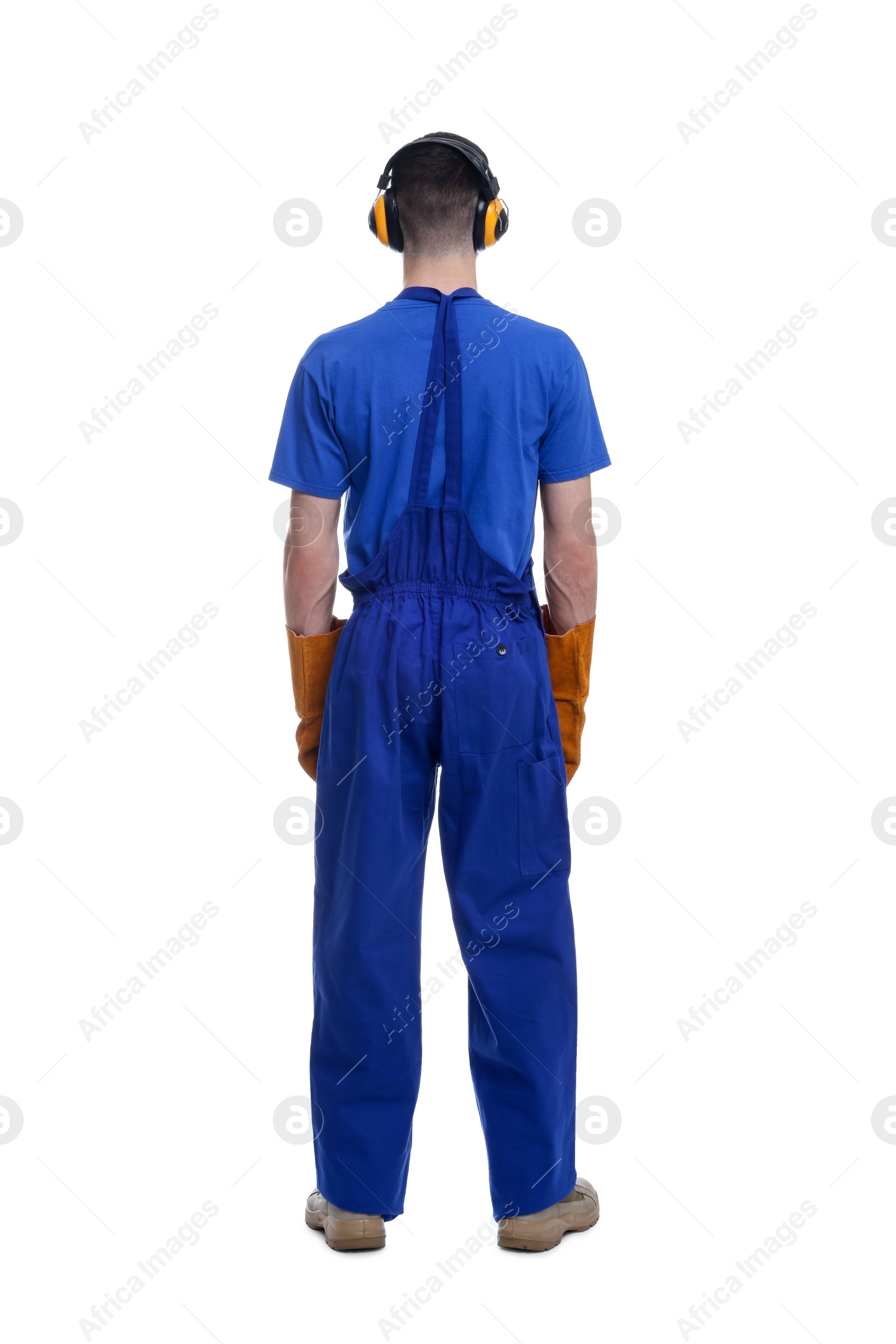 Photo of Young man wearing safety equipment on white background, back view