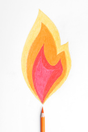 Photo of Drawing of fire and orange pencil on white background, top view