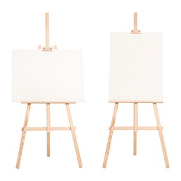 Image of Wooden easel with different canvases isolated on white