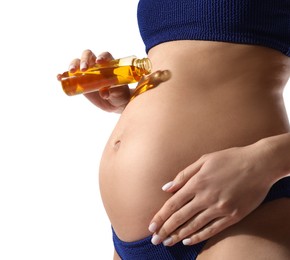 Photo of Pregnant woman applying sun protection oil on white background, closeup
