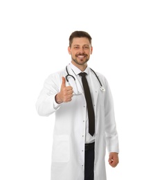 Photo of Portrait of male doctor with thumb up isolated on white. Medical staff