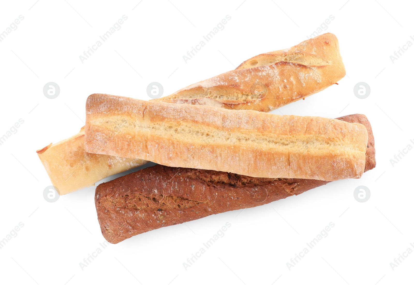 Photo of Different tasty baguettes on white background, top view. Fresh bread