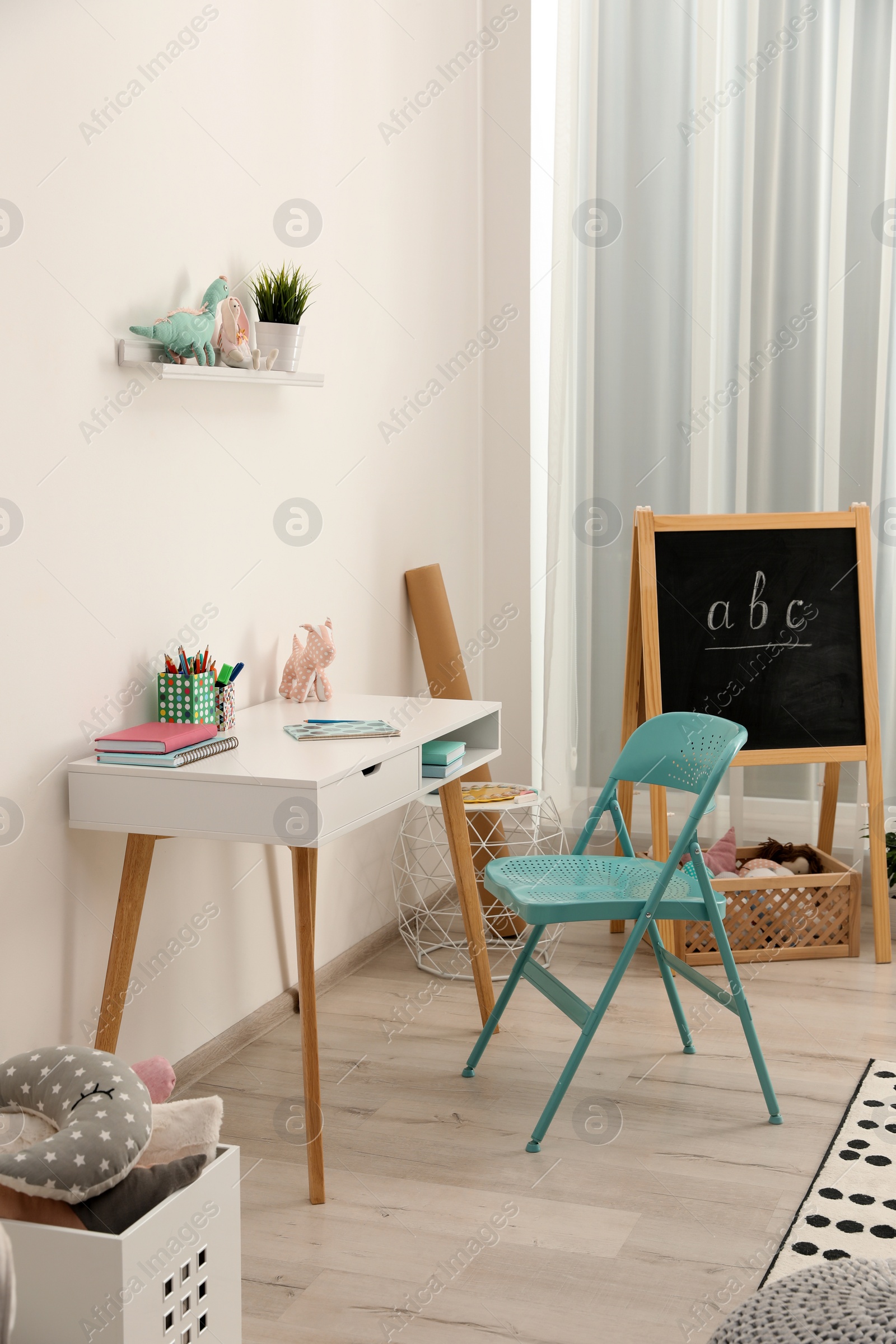 Photo of Modern child room interior with stylish furniture