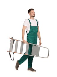 Photo of Worker in uniform holding metal ladder on white background