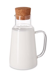 Glass carafe of fresh milk isolated on white