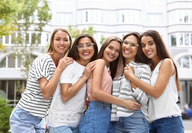 Happy women outdoors on sunny day. Girl power concept