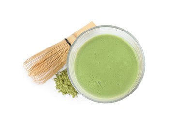 Glass of tasty matcha smoothie, powder and bamboo whisk isolated on white, top view