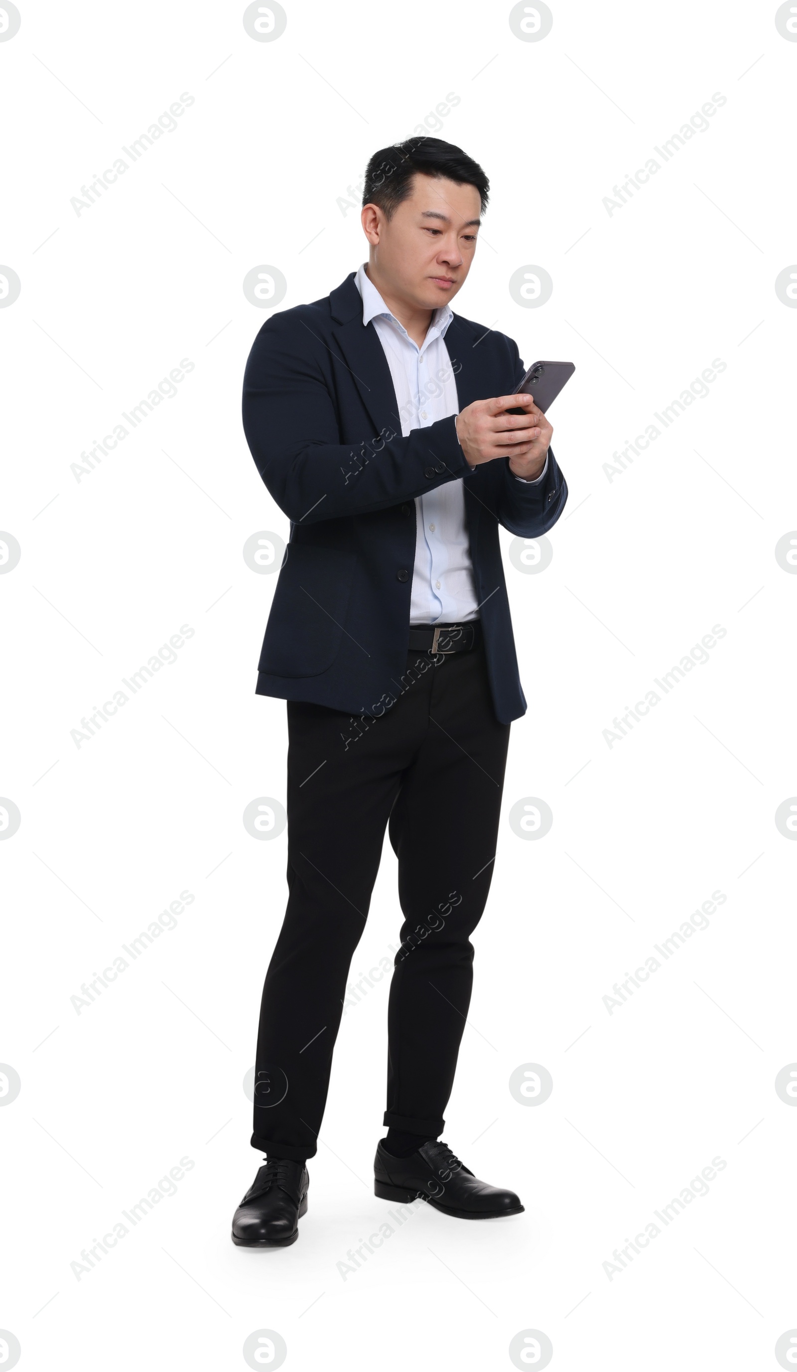Photo of Businessman in suit with smartphone on white background