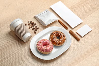 Photo of Composition with items for mock up design on wooden background. Food delivery service