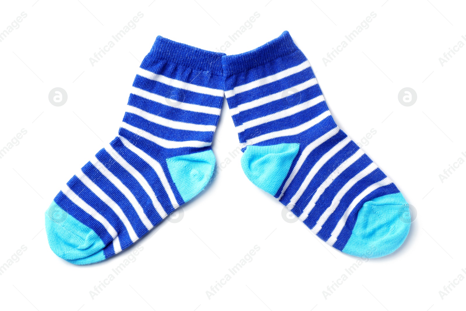 Photo of Cute child socks on white background, top view