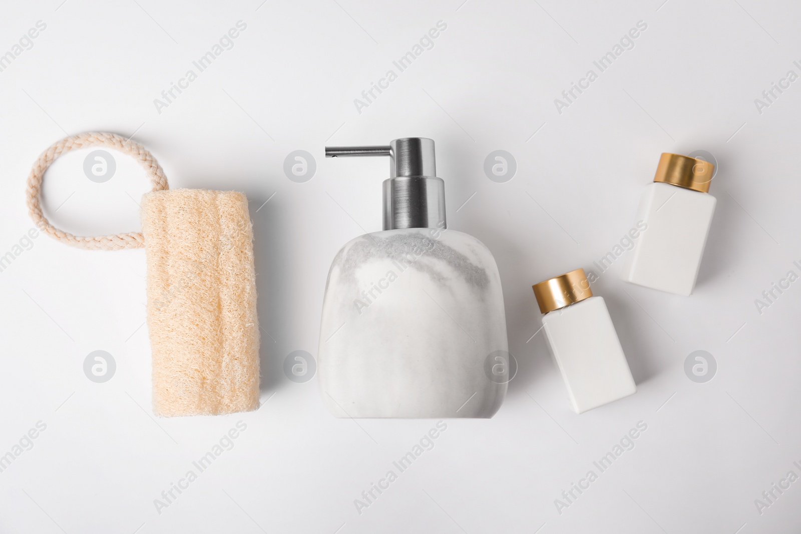 Photo of Flat lay composition with marble soap dispenser on white background