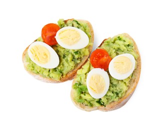 Photo of Delicious sandwiches with guacamole, eggs and tomatoes on white background, top view