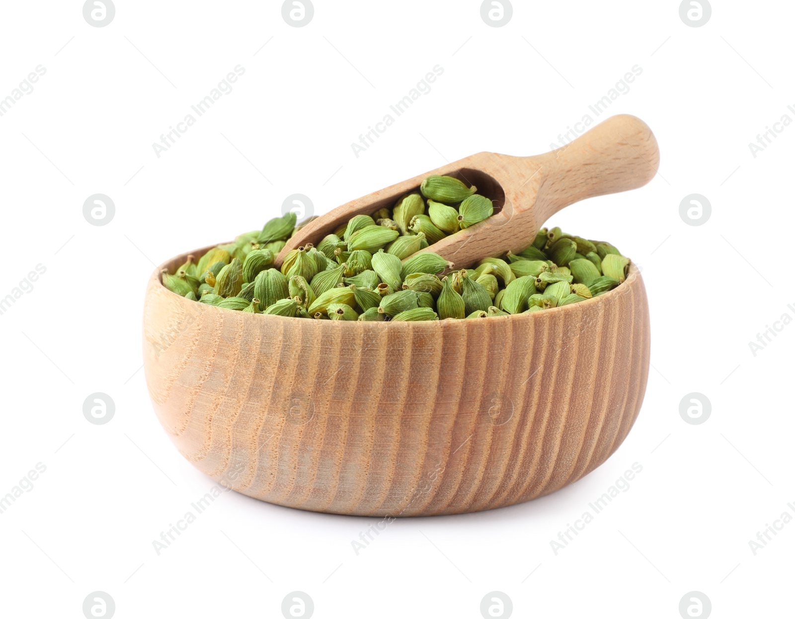 Photo of Wooden bowl and scoop with dry cardamom seeds isolated on white