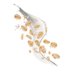 Image of Rolled oats and milk splash isolated on white