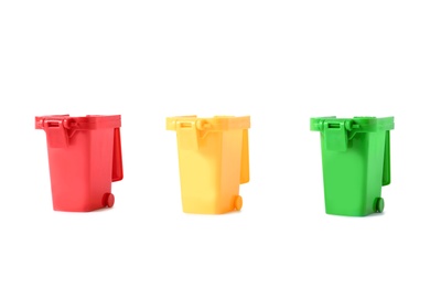 Photo of Trash bins isolated on white. Waste recycling concept