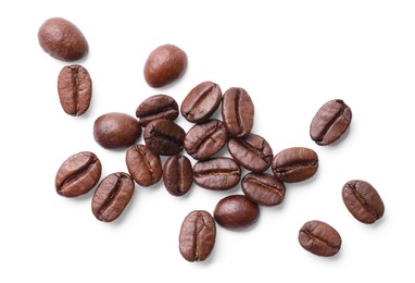 Many roasted coffee beans isolated on white, top view