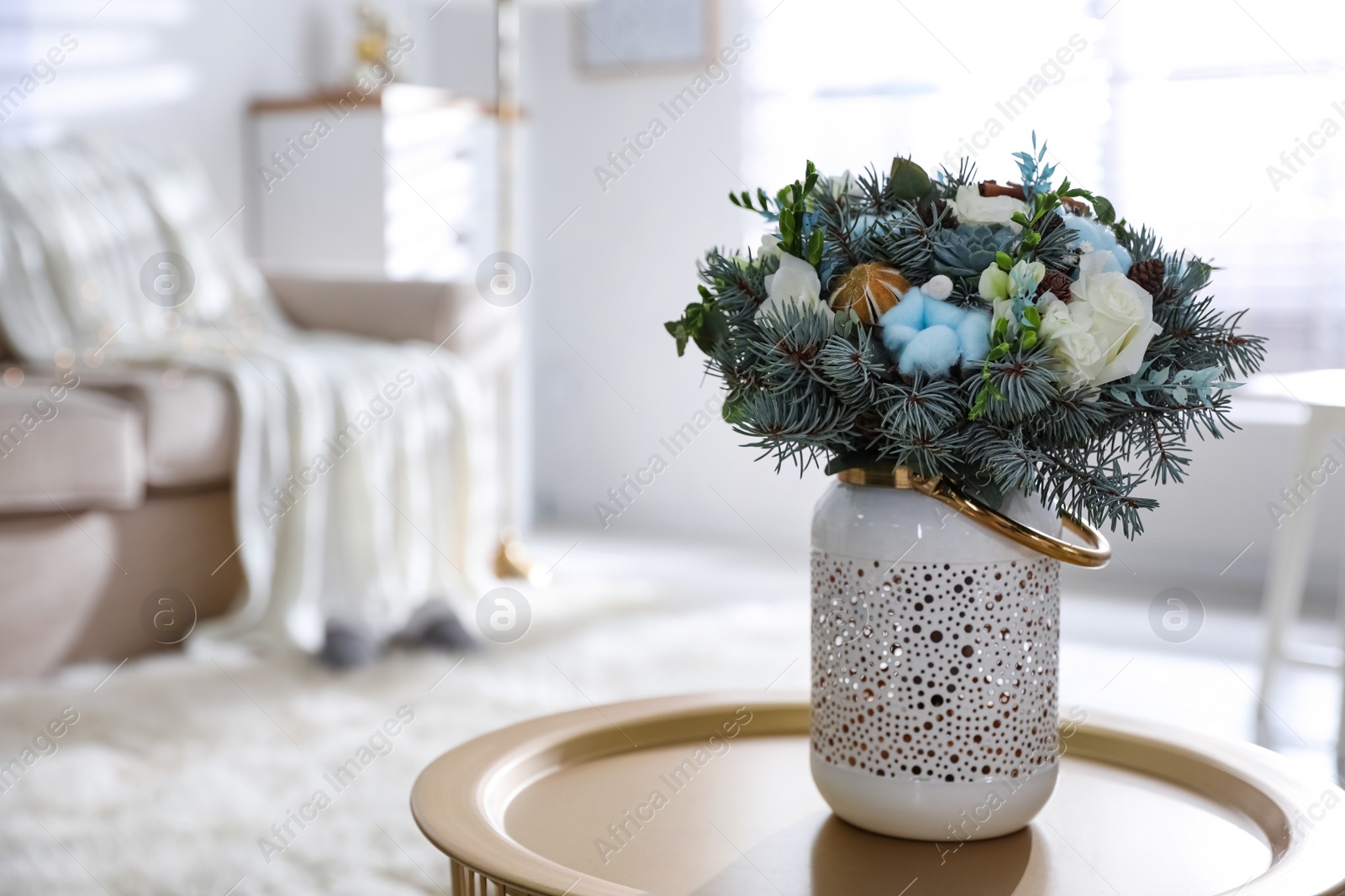 Photo of Beautiful wedding winter bouquet on table indoors. Space for text