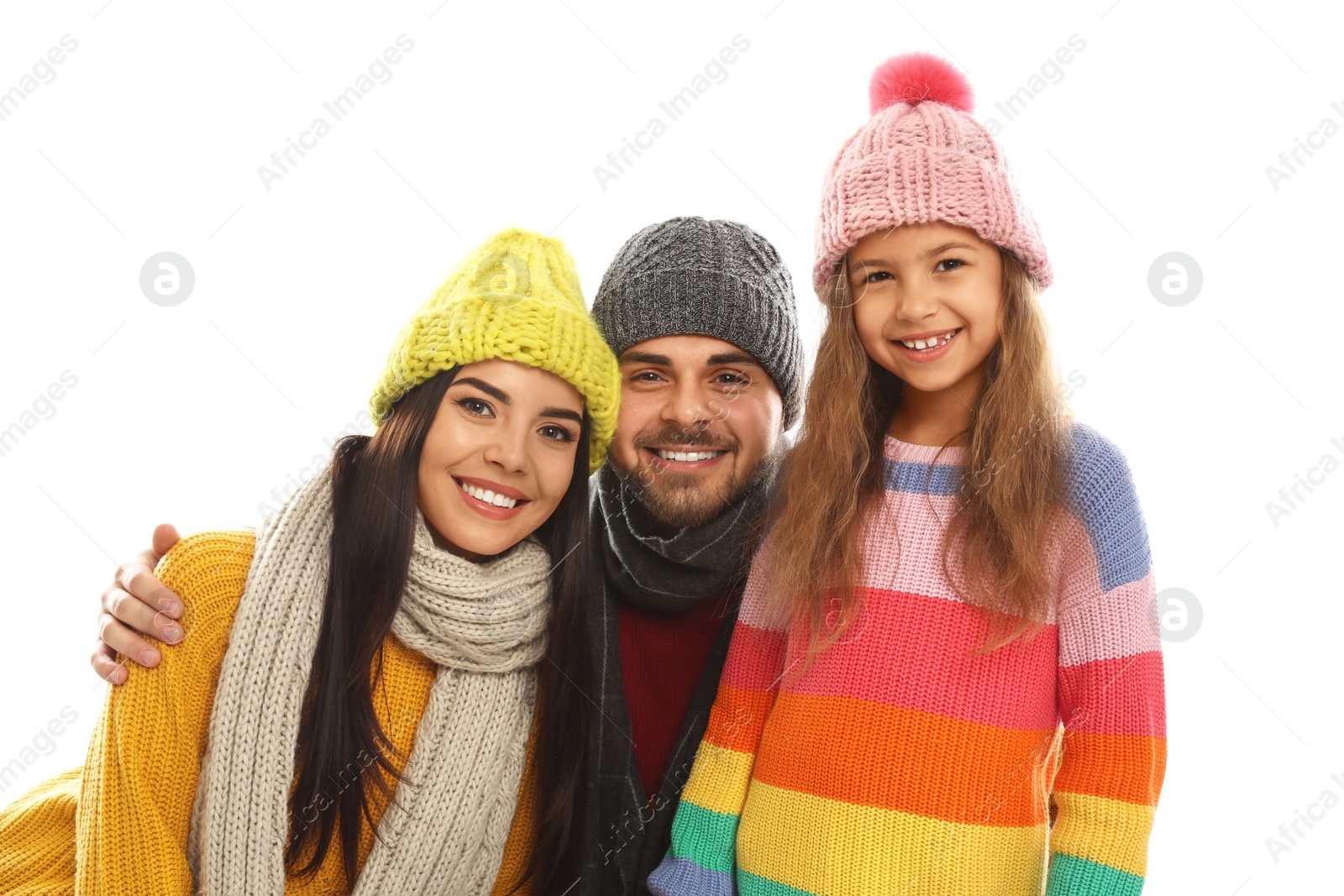 Photo of Happy family in warm clothes on white background. Winter vacation