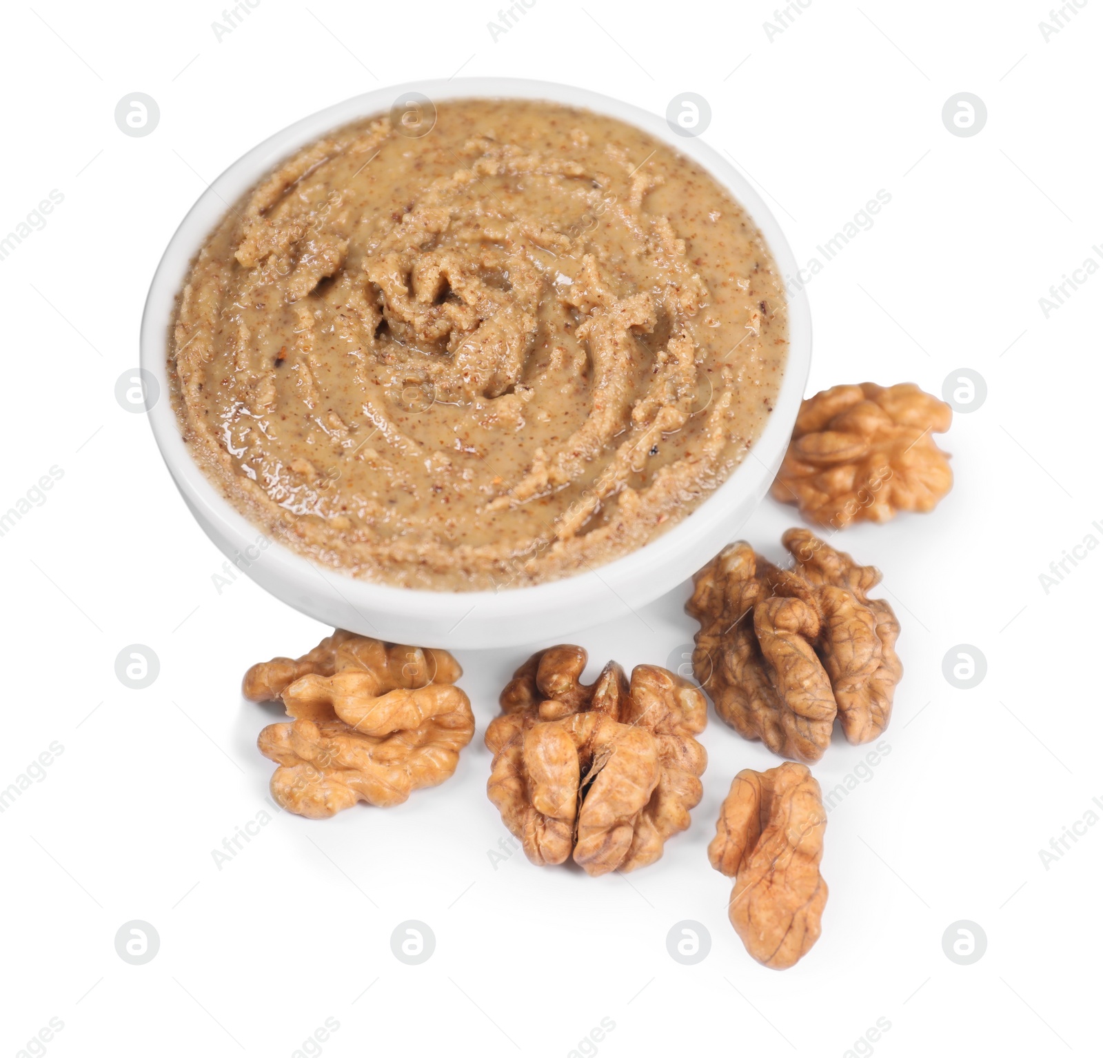 Photo of Delicious nut butter and walnuts isolated on white