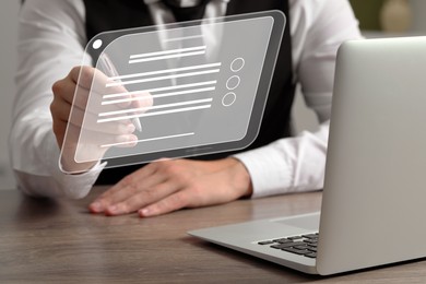 Image of Electronic signature. Man using virtual screen over laptop at wooden table, closeup