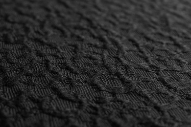 Photo of Textured dark fabric as background, closeup view