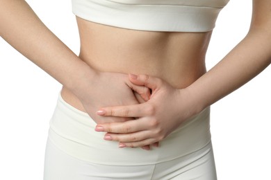 Photo of Woman suffering from pain in lower right abdomen on white background, closeup. Acute appendicitis