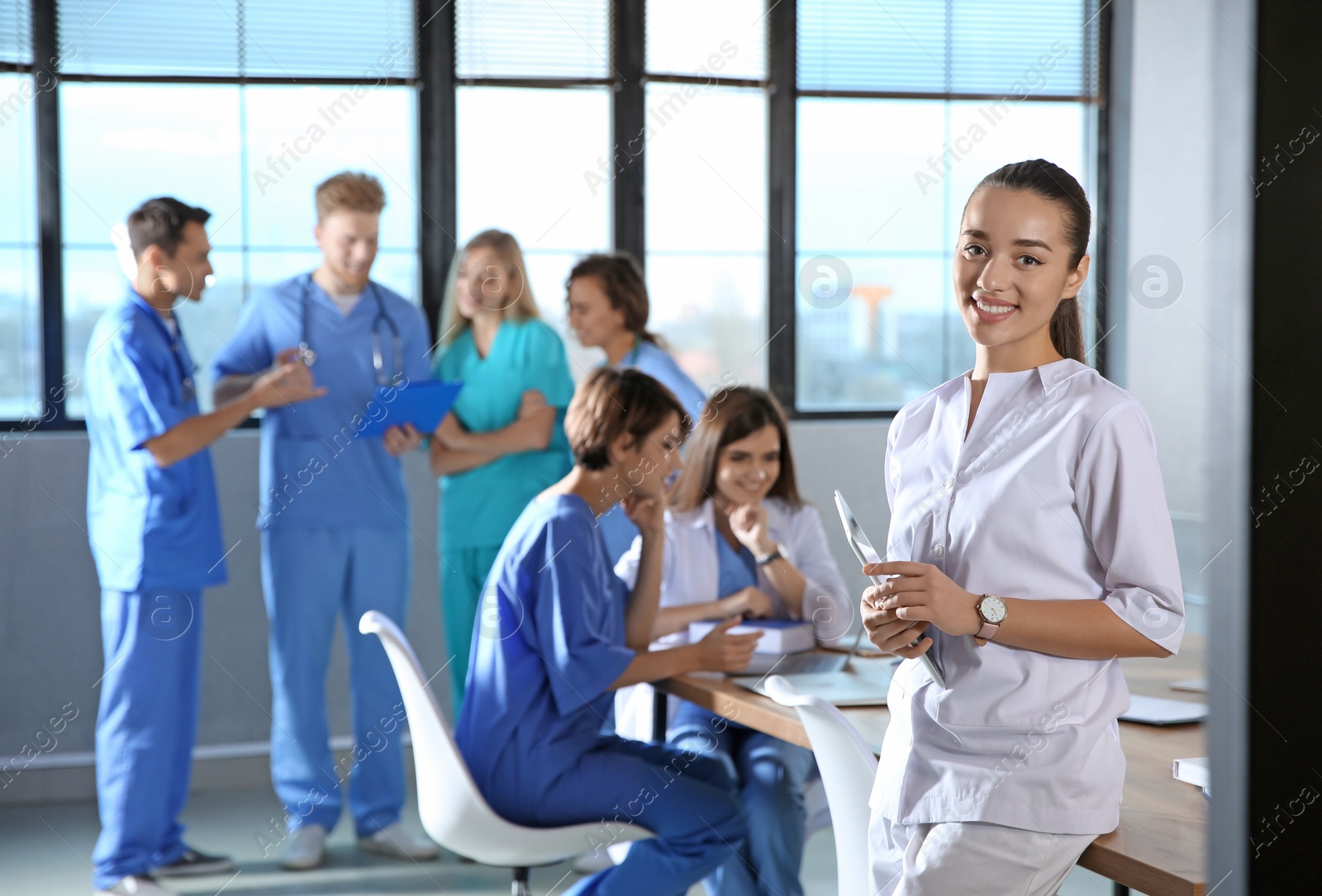 Photo of Smart medical student with her classmates in college