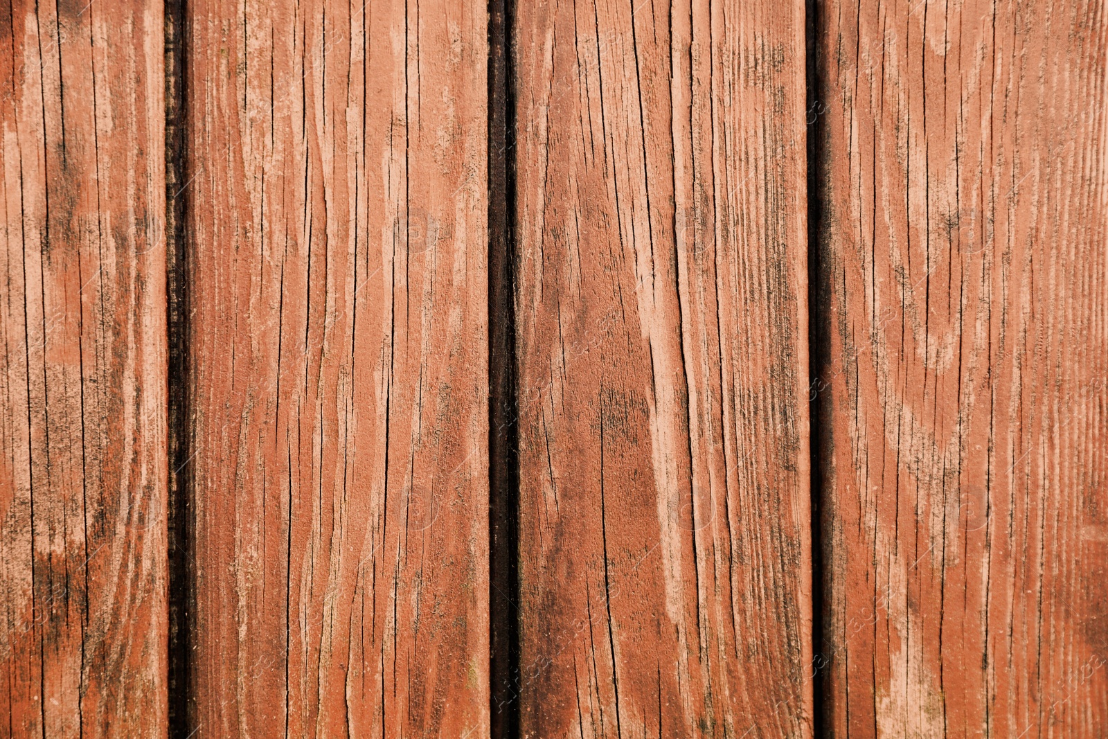 Photo of Texture of light brown wooden planks as background
