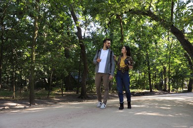 Photo of Lovely couple spending time together in nature reserve