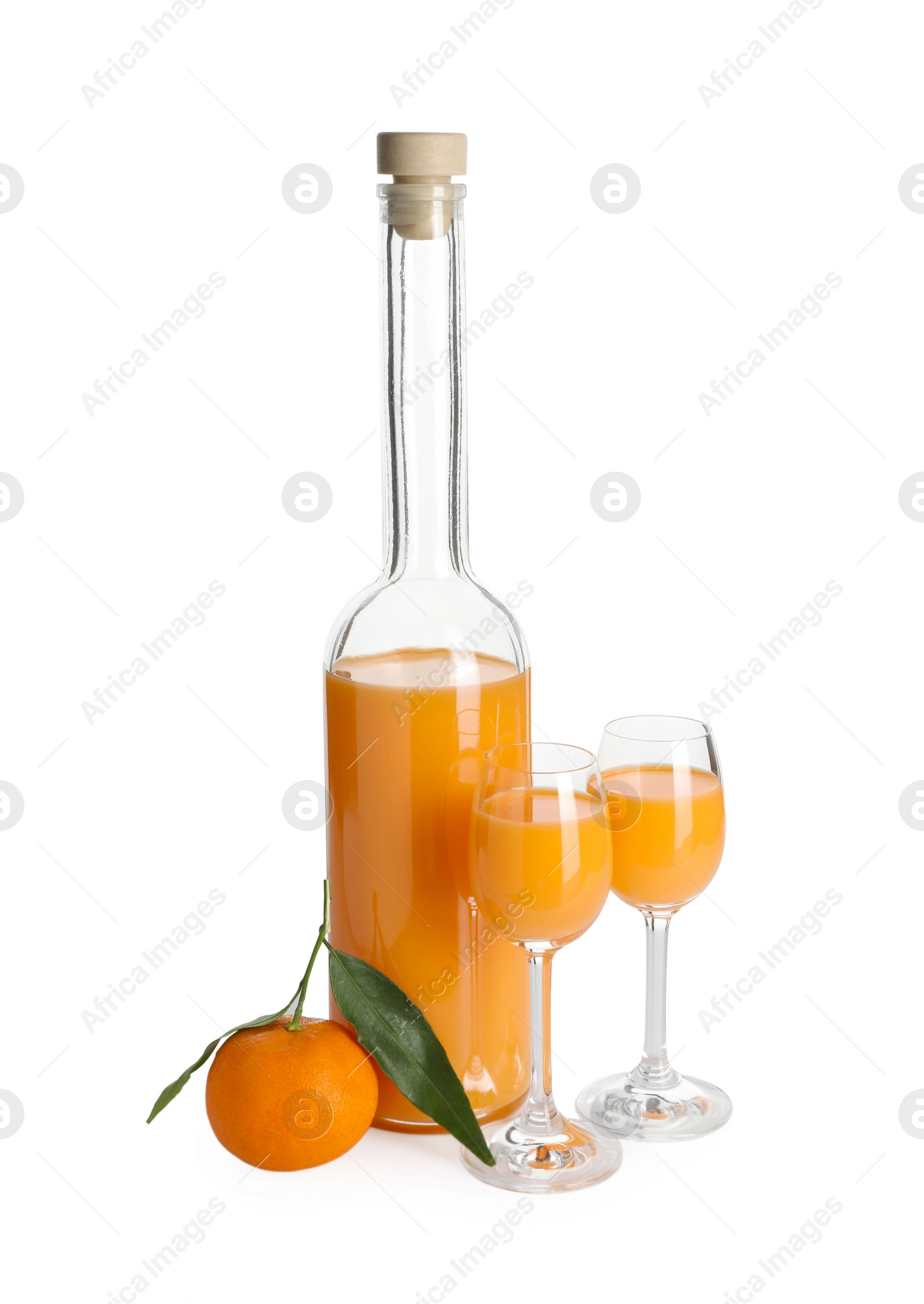 Photo of Tasty tangerine liqueur and fresh fruit isolated on white