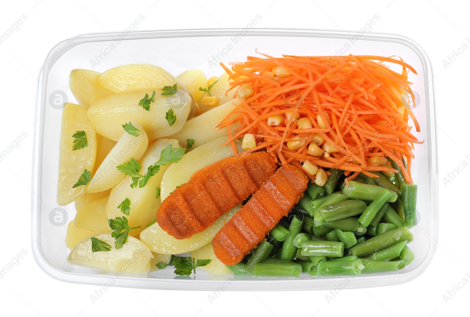 Photo of Tasty potatoes with cutlets and vegetables in plastic container isolated on white, top view