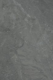 Photo of Texture of light grey marble surface as background, closeup