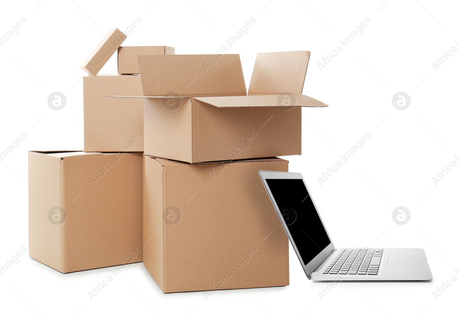 Image of Online selling. Laptop and parcels on white background