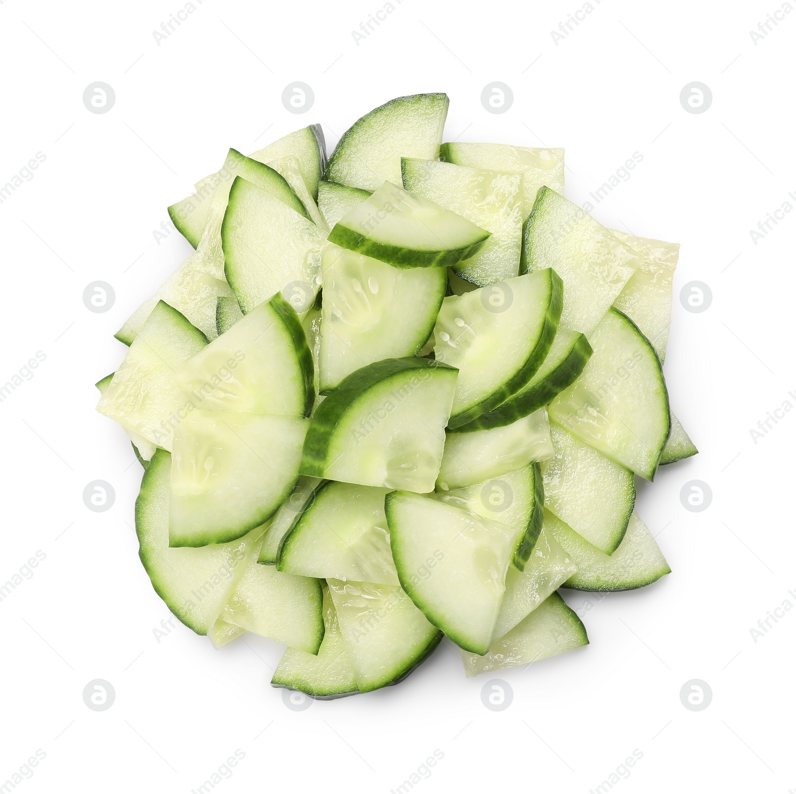 Photo of Pile of fresh cut cucumber isolated on white, top view